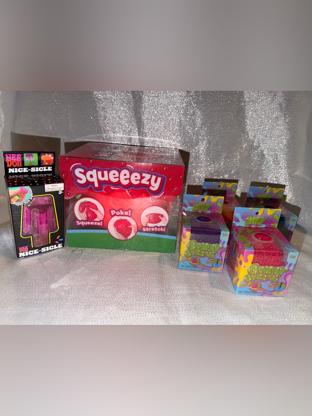 One NeeDoh Nice-Sicle, One Squishy Strawberry & Four Piece Gummy GumDrop Set